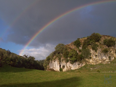 Rainbow over cliffs